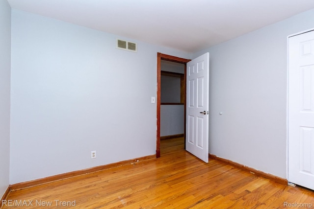 30604 Ann Arbor Trl, Westland, MI 48185 - unfurnished bedroom with light wood-type flooring and baseboards