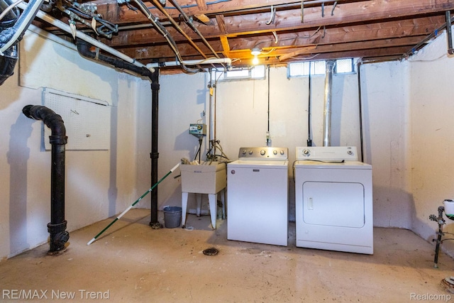 30604 Ann Arbor Trl, Westland, MI 48185 - basement with independent washer and dryer and a sink