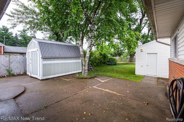 30604 Ann Arbor Trl, Westland, MI 48185 - view of patio with a storage shed
