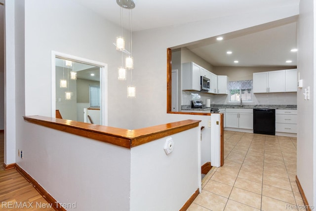 30604 Ann Arbor Trl, Westland, MI 48185 - kitchen featuring appliances with stainless steel finishes, white cabinetry, hanging light fixtures, light tile patterned floors, and recessed lighting