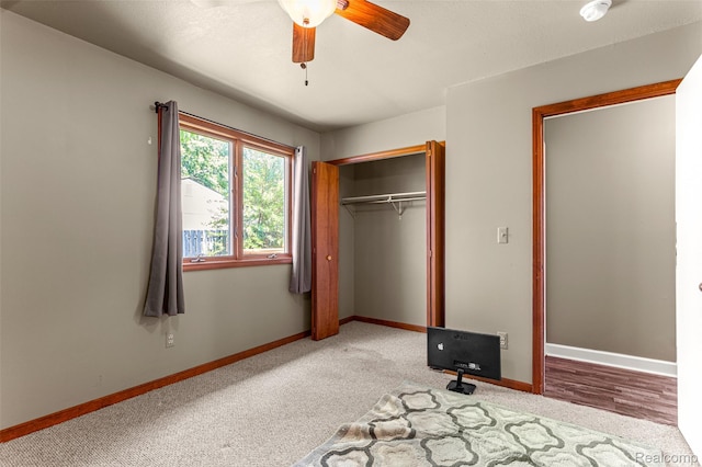 33050 Woodworth Ct, Westland, MI 48185 - unfurnished bedroom featuring carpet, a closet, and ceiling fan