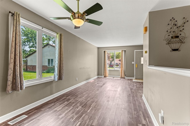 33050 Woodworth Ct, Westland, MI 48185 - unfurnished room featuring wood finished floors, healthy amount of natural light, and a ceiling fan