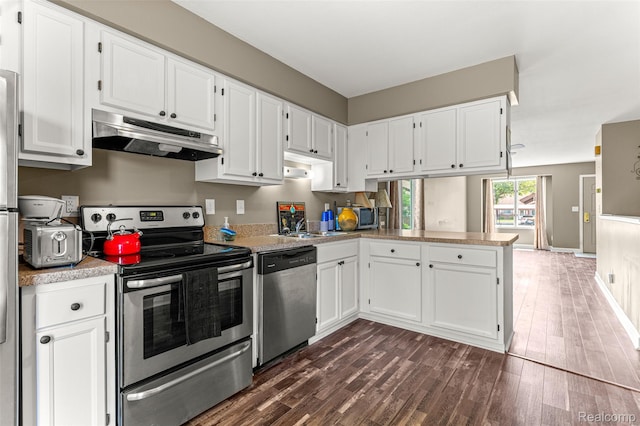 33050 Woodworth Ct, Westland, MI 48185 - kitchen with appliances with stainless steel finishes, ventilation hood, a peninsula, and white cabinets