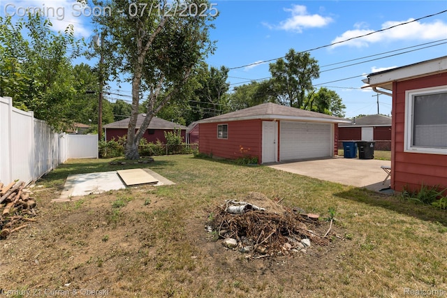 1681 Stieber St, Westland, MI 48186 - view of yard with a detached garage and an outbuilding