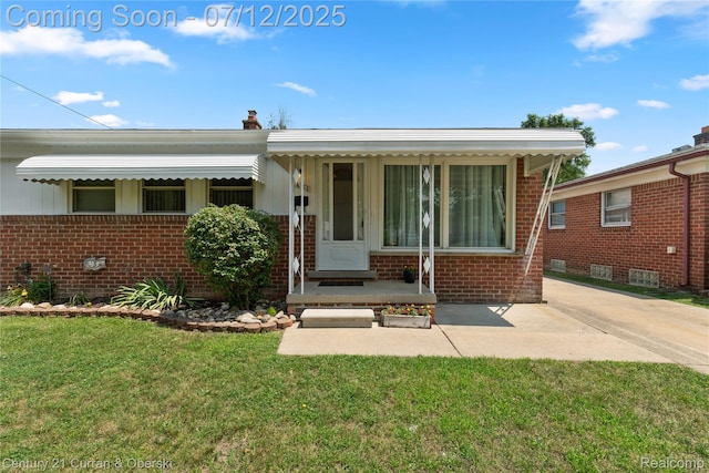 1681 Stieber St, Westland, MI 48186 - view of front of house with brick siding and a front lawn