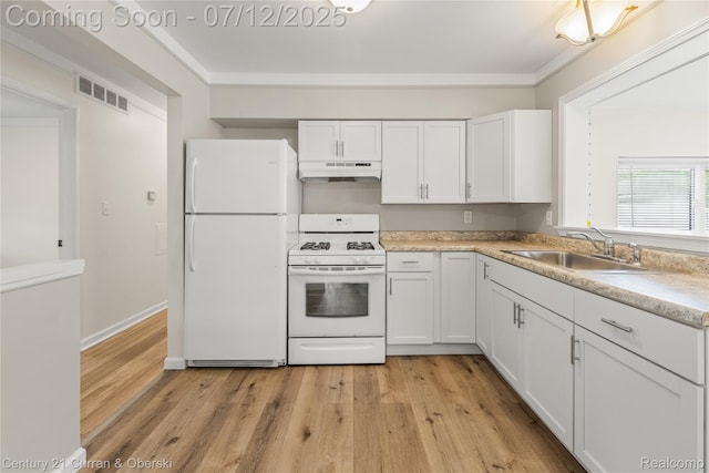 1681 Stieber St, Westland, MI 48186 - kitchen with white appliances, under cabinet range hood, white cabinetry, light wood-type flooring, and light countertops