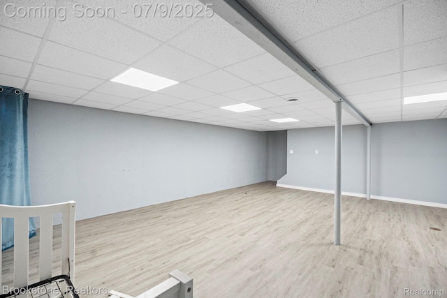 2900 Barton Dr, Sterling Heights, MI 48310 - basement with wood finished floors and a drop ceiling