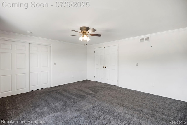 2900 Barton Dr, Sterling Heights, MI 48310 - unfurnished bedroom with dark carpet, ornamental molding, and ceiling fan