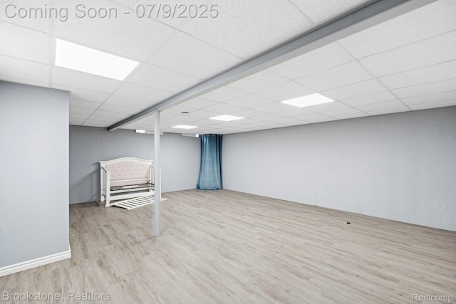 2900 Barton Dr, Sterling Heights, MI 48310 - finished basement with wood finished floors and a drop ceiling