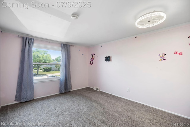 2900 Barton Dr, Sterling Heights, MI 48310 - spare room featuring carpet floors and ornamental molding