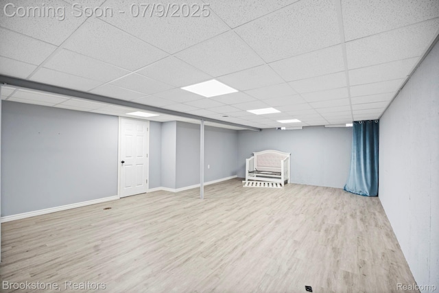 2900 Barton Dr, Sterling Heights, MI 48310 - finished basement featuring wood finished floors and a drop ceiling