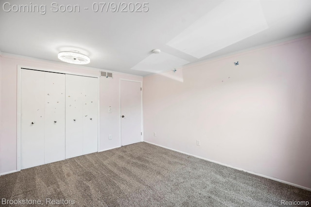 2900 Barton Dr, Sterling Heights, MI 48310 - unfurnished bedroom featuring carpet and a closet