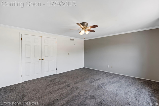 2900 Barton Dr, Sterling Heights, MI 48310 - unfurnished bedroom featuring dark colored carpet, ornamental molding, a closet, and a ceiling fan
