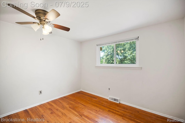 2900 Barton Dr, Sterling Heights, MI 48310 - unfurnished room featuring light wood-style flooring and ceiling fan
