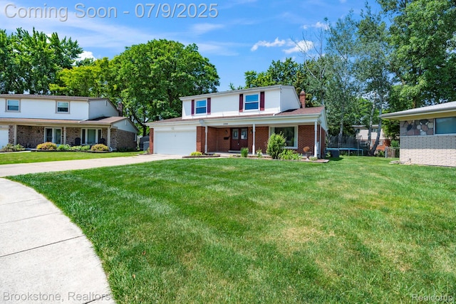 2900 Barton Dr, Sterling Heights, MI 48310 - traditional-style home with concrete driveway, a front lawn, an attached garage, and brick siding