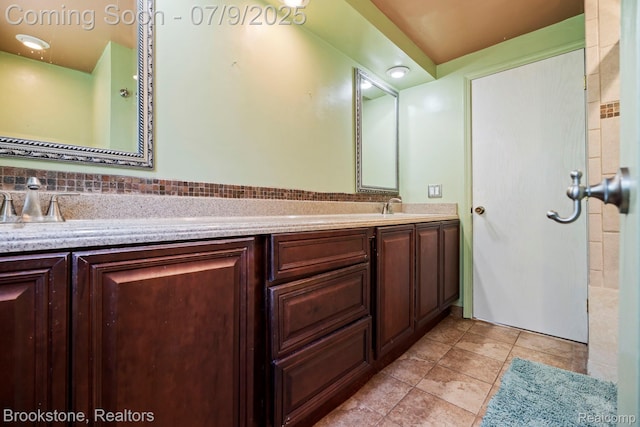 2900 Barton Dr, Sterling Heights, MI 48310 - full bath with double vanity and tile patterned flooring