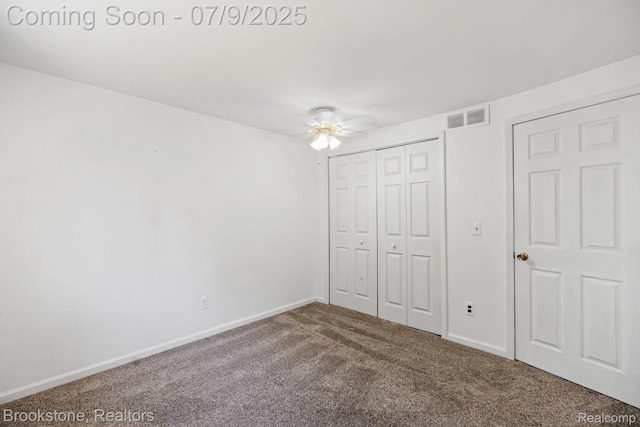 2900 Barton Dr, Sterling Heights, MI 48310 - unfurnished bedroom with carpet flooring, a closet, and a ceiling fan