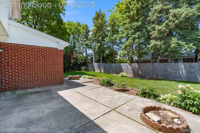 2900 Barton Dr, Sterling Heights, MI 48310 - view of patio / terrace featuring an outdoor fire pit