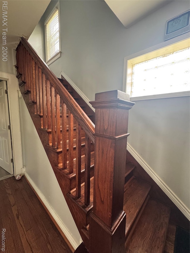 6815 Mettetal St, Detroit, MI 48228 - stairs with wood finished floors and baseboards