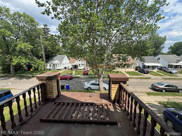 6815 Mettetal St, Detroit, MI 48228 - deck with a residential view