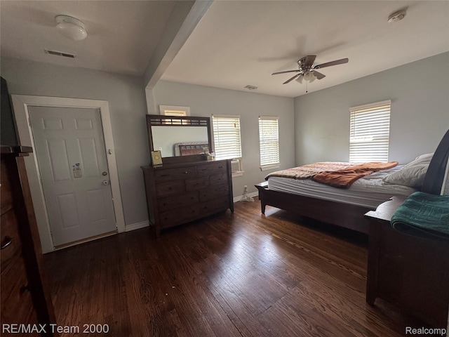 6815 Mettetal St, Detroit, MI 48228 - bedroom with multiple windows, dark wood-type flooring, and a ceiling fan
