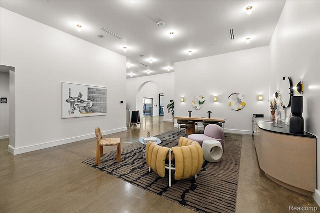 330 Gratiot Ave Unit 1504, Detroit, MI 48226 - living area with arched walkways and wood finished floors