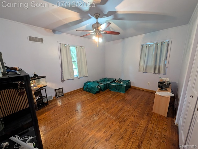 22048 Rougewood Dr, Southfield, MI 48033 - bedroom featuring wood finished floors and a ceiling fan