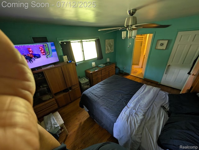 22048 Rougewood Dr, Southfield, MI 48033 - bedroom with wood finished floors and a ceiling fan