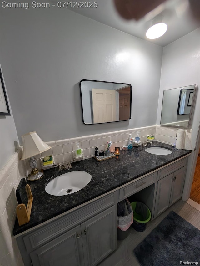 22048 Rougewood Dr, Southfield, MI 48033 - bathroom with double vanity and backsplash