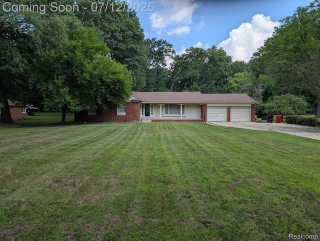 22048 Rougewood Dr, Southfield, MI 48033 - single story home with an attached garage, driveway, a front lawn, and brick siding