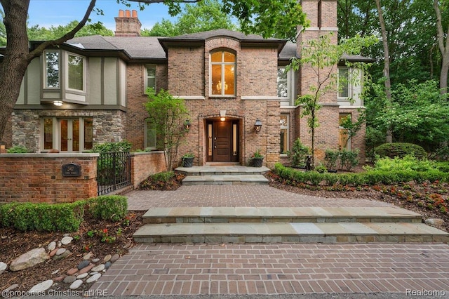 347 Pine Ridge Dr, Bloomfield Hills, MI 48304 - view of front of home featuring a chimney and french doors