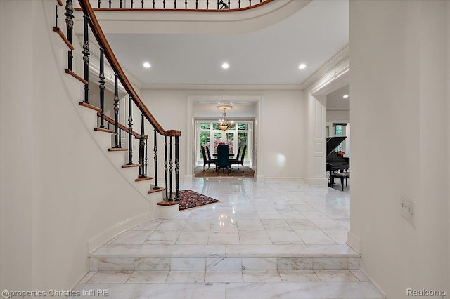 347 Pine Ridge Dr, Bloomfield Hills, MI 48304 - entrance foyer featuring marble finish flooring, crown molding, stairs, and recessed lighting