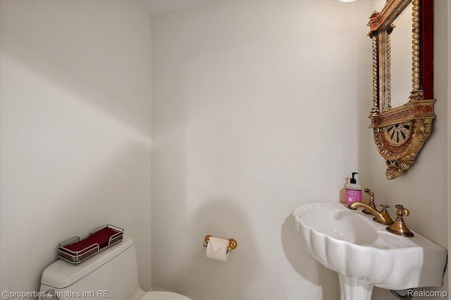 347 Pine Ridge Dr, Bloomfield Hills, MI 48304 - half bathroom with toilet and a sink