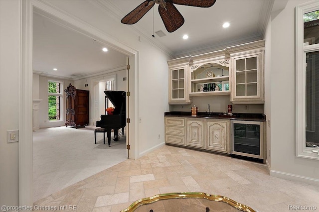 347 Pine Ridge Dr, Bloomfield Hills, MI 48304 - indoor wet bar with beverage cooler, ceiling fan, ornamental molding, recessed lighting, and stone tile flooring