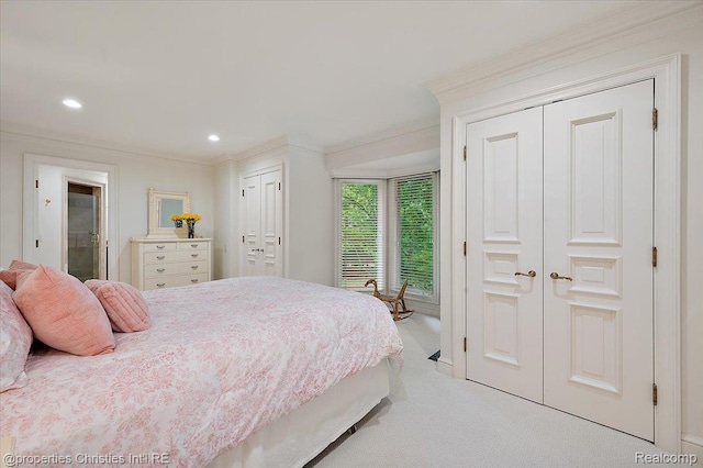 347 Pine Ridge Dr, Bloomfield Hills, MI 48304 - carpeted bedroom featuring two closets, ornamental molding, and recessed lighting