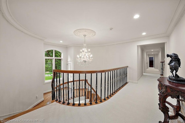 347 Pine Ridge Dr, Bloomfield Hills, MI 48304 - hallway featuring an upstairs landing, recessed lighting, a chandelier, and ornamental molding