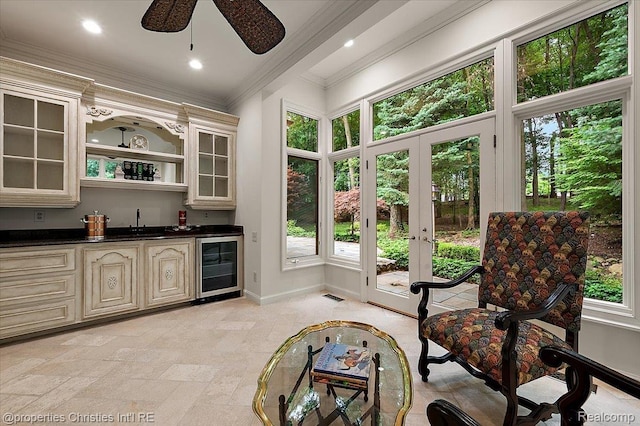 347 Pine Ridge Dr, Bloomfield Hills, MI 48304 - indoor wet bar with beverage cooler, french doors, plenty of natural light, ornamental molding, and recessed lighting