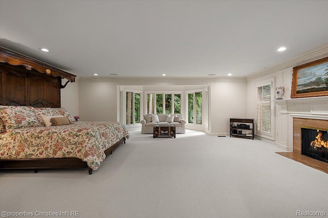 347 Pine Ridge Dr, Bloomfield Hills, MI 48304 - carpeted bedroom with ornamental molding, recessed lighting, and a fireplace