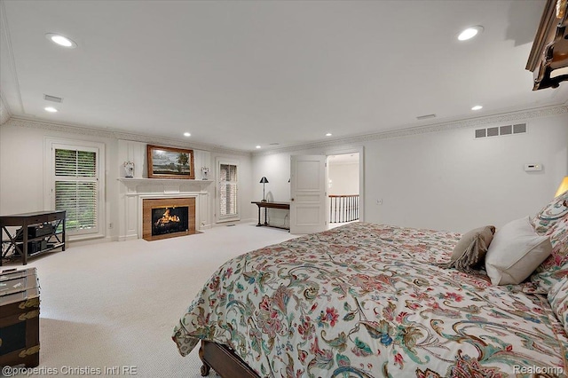 347 Pine Ridge Dr, Bloomfield Hills, MI 48304 - bedroom with ornamental molding, carpet, recessed lighting, and a fireplace with flush hearth