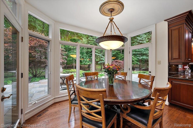 347 Pine Ridge Dr, Bloomfield Hills, MI 48304 - dining room with healthy amount of natural light and light wood-style floors