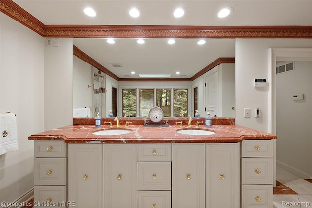 347 Pine Ridge Dr, Bloomfield Hills, MI 48304 - bathroom featuring double vanity, crown molding, and recessed lighting
