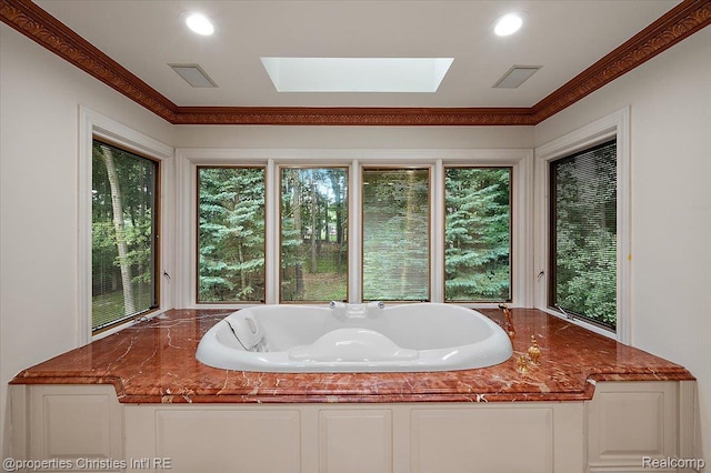 347 Pine Ridge Dr, Bloomfield Hills, MI 48304 - bathroom with healthy amount of natural light, a skylight, a bath, and crown molding