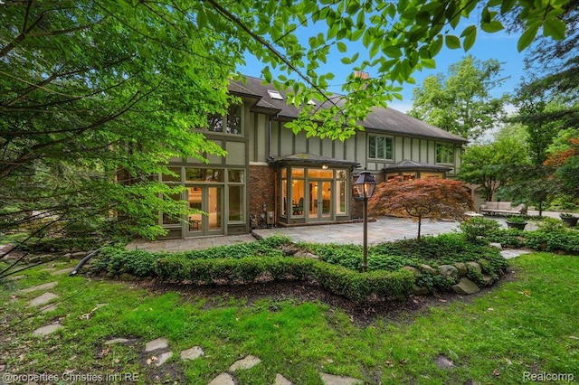 347 Pine Ridge Dr, Bloomfield Hills, MI 48304 - rear view of house featuring french doors and a patio