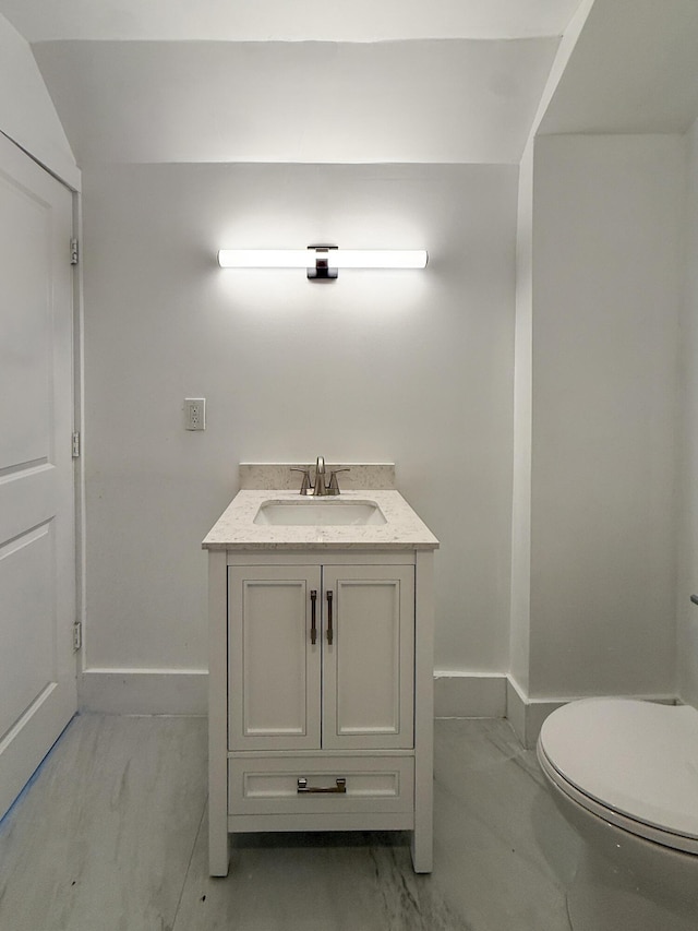 15786 Rutherford St, Detroit, MI 48227 - bathroom featuring vanity and marble finish floors