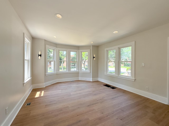 15786 Rutherford St, Detroit, MI 48227 - unfurnished room featuring wood finished floors and recessed lighting