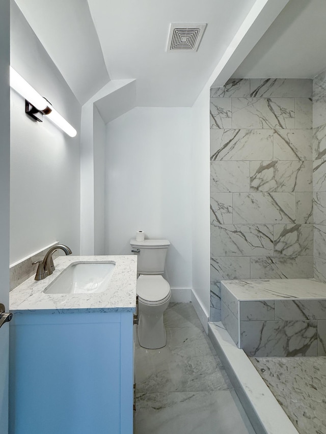 15786 Rutherford St, Detroit, MI 48227 - bathroom with marble finish flooring, vanity, and tiled shower