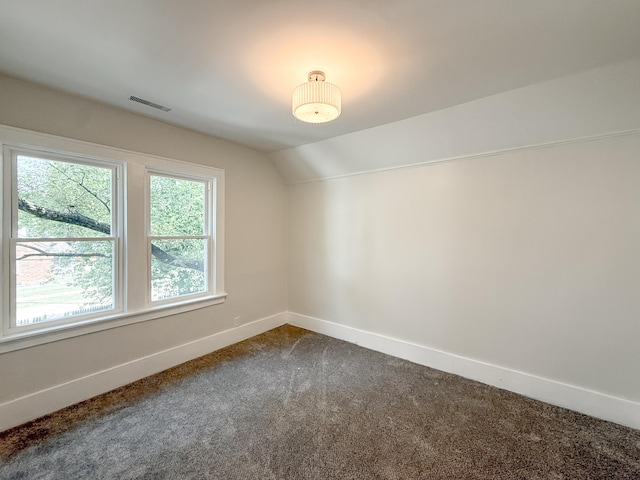 15786 Rutherford St, Detroit, MI 48227 - bonus room featuring dark colored carpet and vaulted ceiling