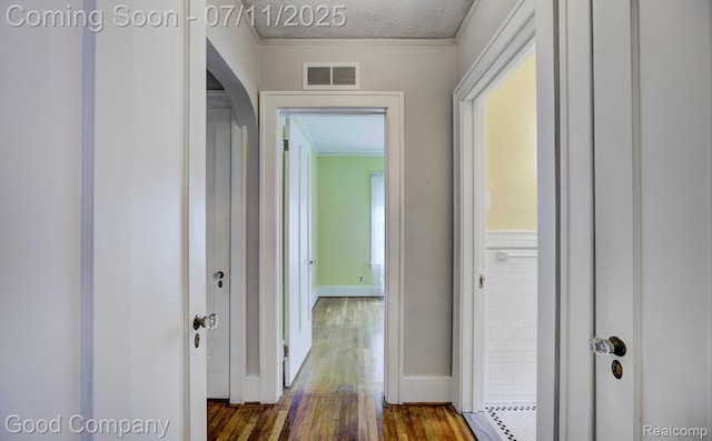 515 W Golden Gate, Detroit, MI 48203 - hall with dark wood-style flooring, crown molding, and a textured ceiling