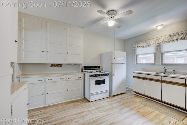 515 W Golden Gate, Detroit, MI 48203 - kitchen with white appliances, white cabinetry, light countertops, and ceiling fan