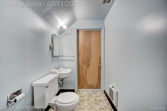 515 W Golden Gate, Detroit, MI 48203 - half bath featuring toilet and lofted ceiling
